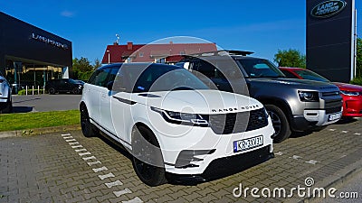 Krakow, Poland - May 21, 2023: Jaguar Land Rover logo on a store. Editorial Stock Photo