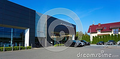 Krakow, Poland - May 21, 2023: Jaguar Land Rover logo on a store. Editorial Stock Photo