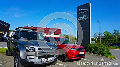 Krakow, Poland - May 21, 2023: Jaguar Land Rover logo on a store. Editorial Stock Photo