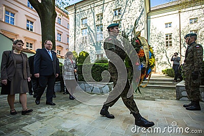 KRAKOW, POLAND - Officials at ceremony of laying flowers to the monument to Hugo Kollataj Editorial Stock Photo