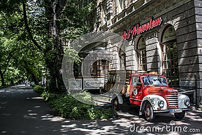 Krakow, Poland 10.05.2015: Red Truck with beer barrels to attract tourists bar restaurant below wawel cathedral Editorial Stock Photo