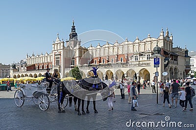 Carriage and Horses in Krakow, Poland on September 19, 2014. Unidentified people Editorial Stock Photo