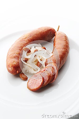 Kransky sausage with boiled turnip and greaves Stock Photo