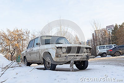 Krasnoyarsk, Russia, August 10, 2019: Russian retro Lada 2106 car on the street abandoned or stolen. Editorial Stock Photo