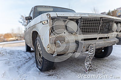 Krasnoyarsk, Russia, August 10, 2019: Russian retro Lada 2106 car on the street abandoned or stolen. Editorial Stock Photo
