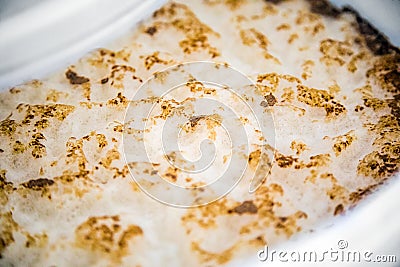 Krausen of Ale Home Brew Fermenting into a Food Grade Plastic Bu Stock Photo