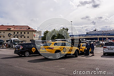 Kristiansand Norway Taxis picking up passengers from the Color Line ferry terminal Editorial Stock Photo