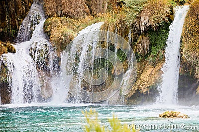 Krka, Sibenik, Croatia - Watrefall spume spraying into a cascade at Krka National Park Stock Photo