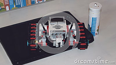 KROPIVNITSKIY, UKRAINE â€“ 12 MAY, 2018: Lego robot Mindstorms EV3 with laptop. Programmable four wheels drive 4WD robotic car Editorial Stock Photo