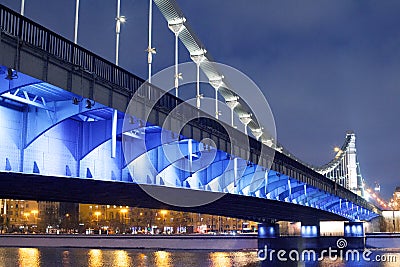 Krymsky Bridge or Crimean bridge in Moscow, Russia night view with blue illumination Stock Photo