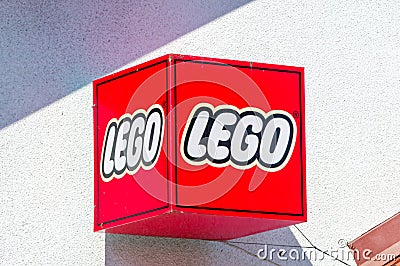 Lego brand name and logo on red cube. Editorial Stock Photo