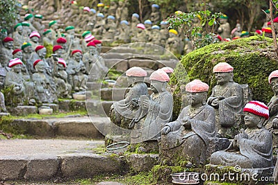 Ksitigarbha jizo statues with knitted hats at daisho-in temple on Miyajima island Editorial Stock Photo