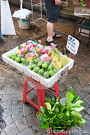 Kuala Lumpur Chinatown to make a garland for the deities Editorial Stock Photo