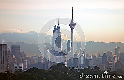 Kuala Lumpur Cityscape at sunrise with KLCC & Menara KL Tower in Kuala Lumpur, Malaysia. Stock Photo