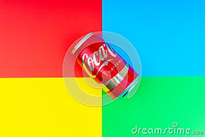 Coca - Cola carbonated soft drink on colorful background Editorial Stock Photo
