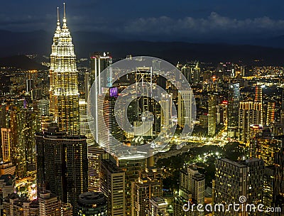 KUALA LUMPUR / MALAYSIA - 2019: Beautiful aerial night city lights view from Menara KL tower Editorial Stock Photo