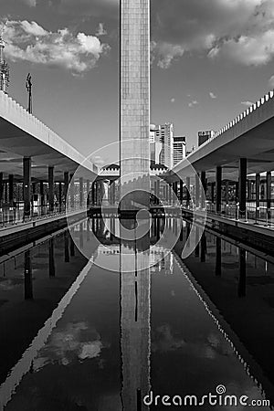 Grayscale shot of the obelisk reflecting in a mosque Editorial Stock Photo