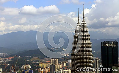 Close up view of Petronas Twin Towers skyscraper peak in Kuala Lumpur, Malaysia Editorial Stock Photo