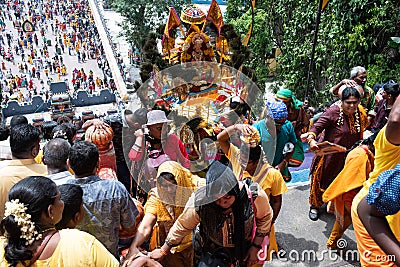 Hindu devotees walking up the staircase at Thaipusam Festival Batu Caves Editorial Stock Photo