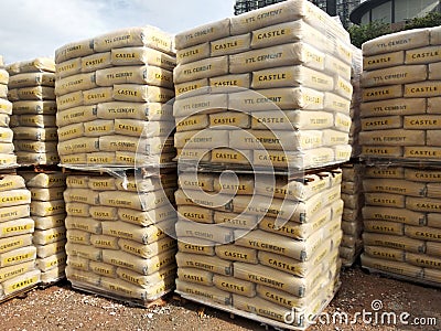 Stock pile of portland cement in commercial bags. Editorial Stock Photo