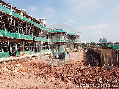 Building substructure and super-structure under construction using the open cut method. Editorial Stock Photo