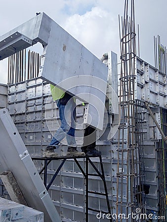 Precast system aluminium formwork used at the construction site as the reusable concrete form-work. Editorial Stock Photo