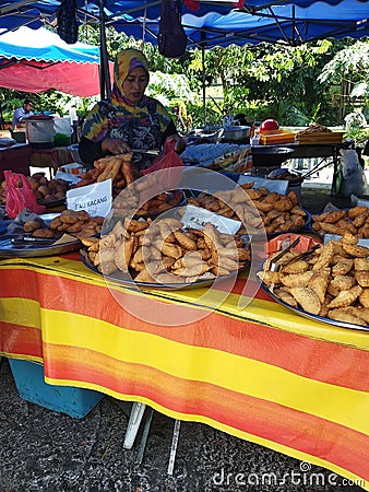 Variety of famous traditional Malaysian sweet and dessert sell-by hawkers in the street Ramadhan Bazaar. Editorial Stock Photo