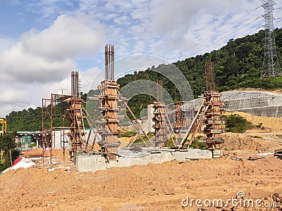 Column timber form work and reinforcement bar at the construction site. Editorial Stock Photo