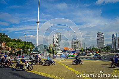 Kuala Lumpur, Malaysia - March 9, 2017: Malaysia flag waving tall in Merdaka Square, in the city downtown. Editorial Stock Photo