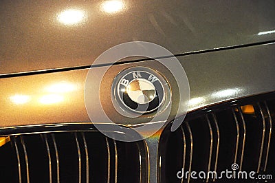 BMW car manufacturer commercial emblem logos fix at the car. Editorial Stock Photo