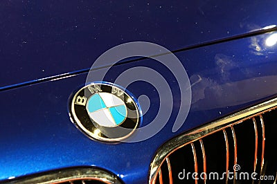 BMW car manufacturer commercial emblem logos fix at the car. Editorial Stock Photo