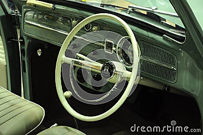 Classic car driver steering and interior dashboard. Editorial Stock Photo