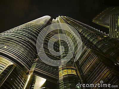 KUALA LUMPUR / MALAYSIA - 2019 : Night view of the impressive Petronas twin towers at Kuala Lumpur KLCC area Editorial Stock Photo