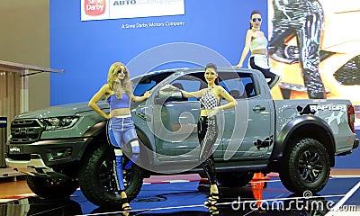 Model posed with Ford Ranger Raptor displayed during Kuala Lumpur International Motor Editorial Stock Photo