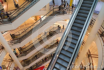 KUALA LUMPUR, MALAYSIA - SEP 27: Escalators in Suria Shopping Ma Editorial Stock Photo