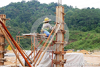 Column timber formwork and reinforcement bar at the construction site. Editorial Stock Photo