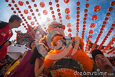 Malaysian traditional lion dance performs a dance routine outside the Thean Hou Temple Editorial Stock Photo
