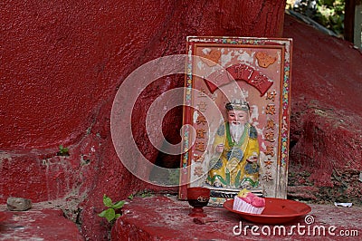 Small decorated Chinese Monk stone plate Editorial Stock Photo