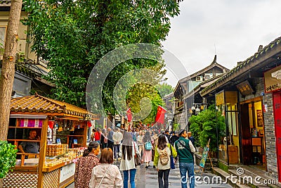 Kuan Zhai Alley or Wide and Narrow Alley ancient street in Chengdu during afternoon at Chengdu Sichuan , China : 13 October 2023 Editorial Stock Photo