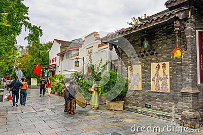 Kuan Zhai Alley or Wide and Narrow Alley ancient street in Chengdu during afternoon at Chengdu Sichuan , China : 13 October 2023 Editorial Stock Photo