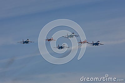 KUBINKA, MOSCOW REGION, RUSSIA Aerobatic team `Swifts` and `Russian knights` aircraft `SU-30 and MiG-29` Editorial Stock Photo