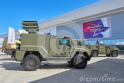 KUBINKA, RUSSIA, AUG.24, 2018: View on heavy military armored 4WD vehicle Typhoon K-53949 for troopers and different weapon transp Editorial Stock Photo