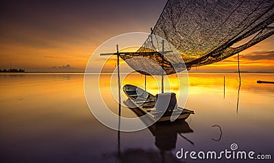 wonderful sunrise colour with boat Stock Photo