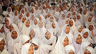 Faces of young Indonesian Muslim women at a religious event Editorial Stock Photo