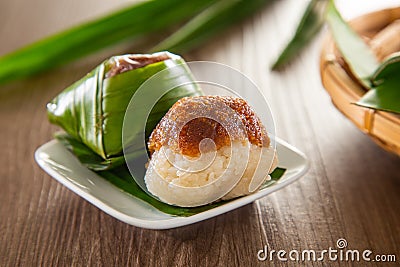 Kuih Pulut inti, traditional Malaysian Nyonya sweet dessert. It is made of steamed glutinous rice with coconut milk and eaten with Stock Photo