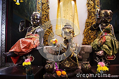 Kuman thong or Kumara statue deity angel for thai people travel visit respect praying blessing holy mysterious mystery at Wat Editorial Stock Photo