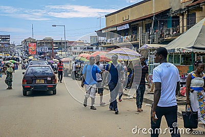 Crowded African Road with Local Ghana People in Kumasi city Editorial Stock Photo