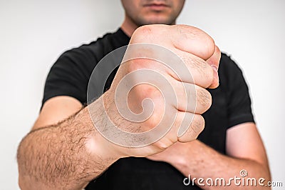 Kung fu fighter with strong hands and clenched fists Stock Photo