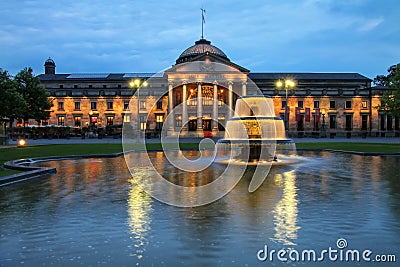 Kurhaus and Bowling Green in the evening with lights, Wiesbaden, Hesse, Germany Editorial Stock Photo