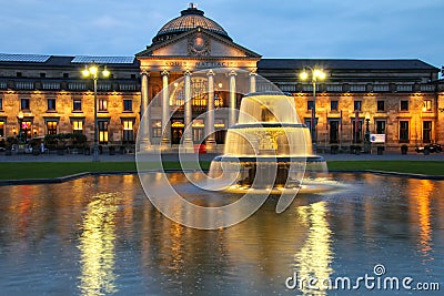 Kurhaus and Bowling Green in the evening with lights, Wiesbaden, Hesse, Germany Editorial Stock Photo